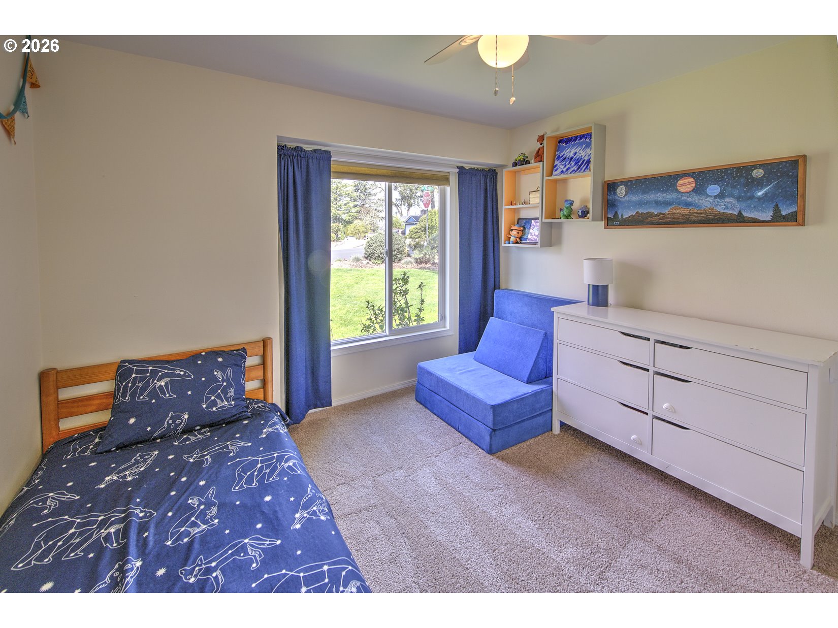 16020 Southwest Rosa Road Beaverton, OR 97007 - Photo 17 of 42 a bedroom with furniture and a window