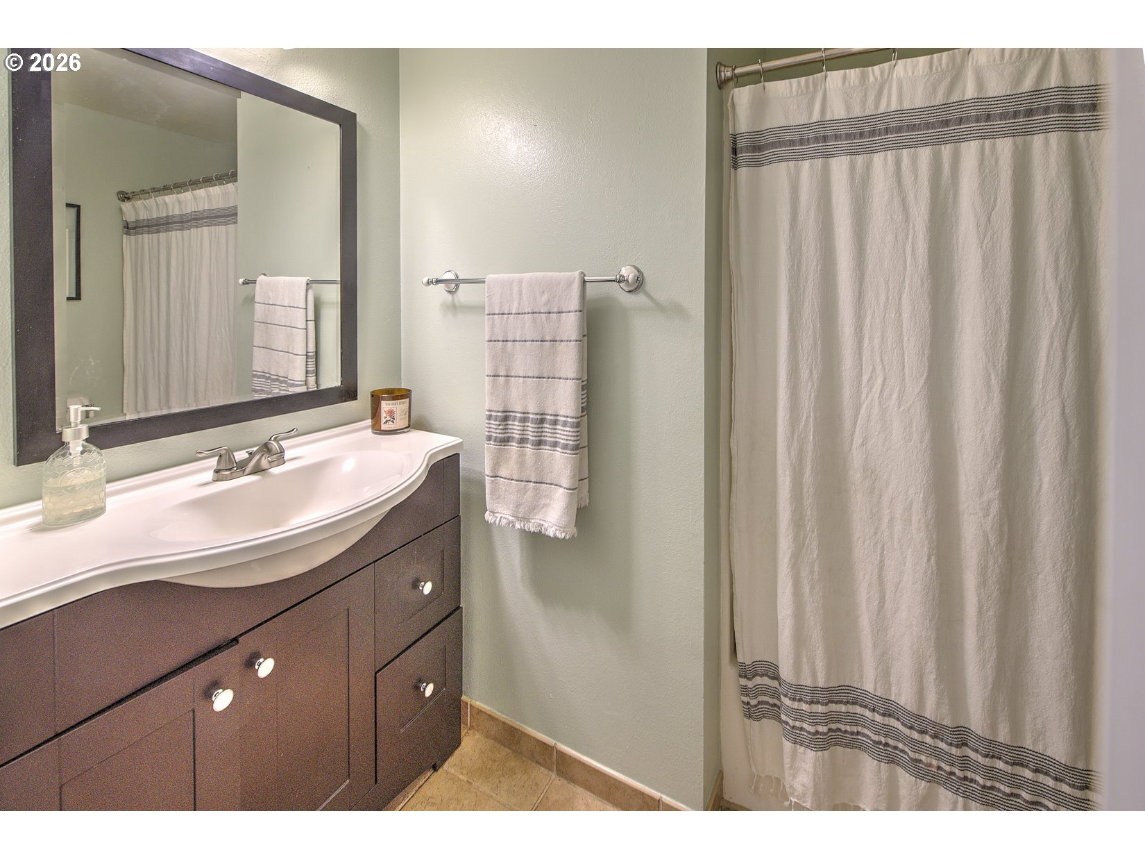 16020 Southwest Rosa Road Beaverton, OR 97007 - Photo 18 of 42 a bathroom with a sink and mirror