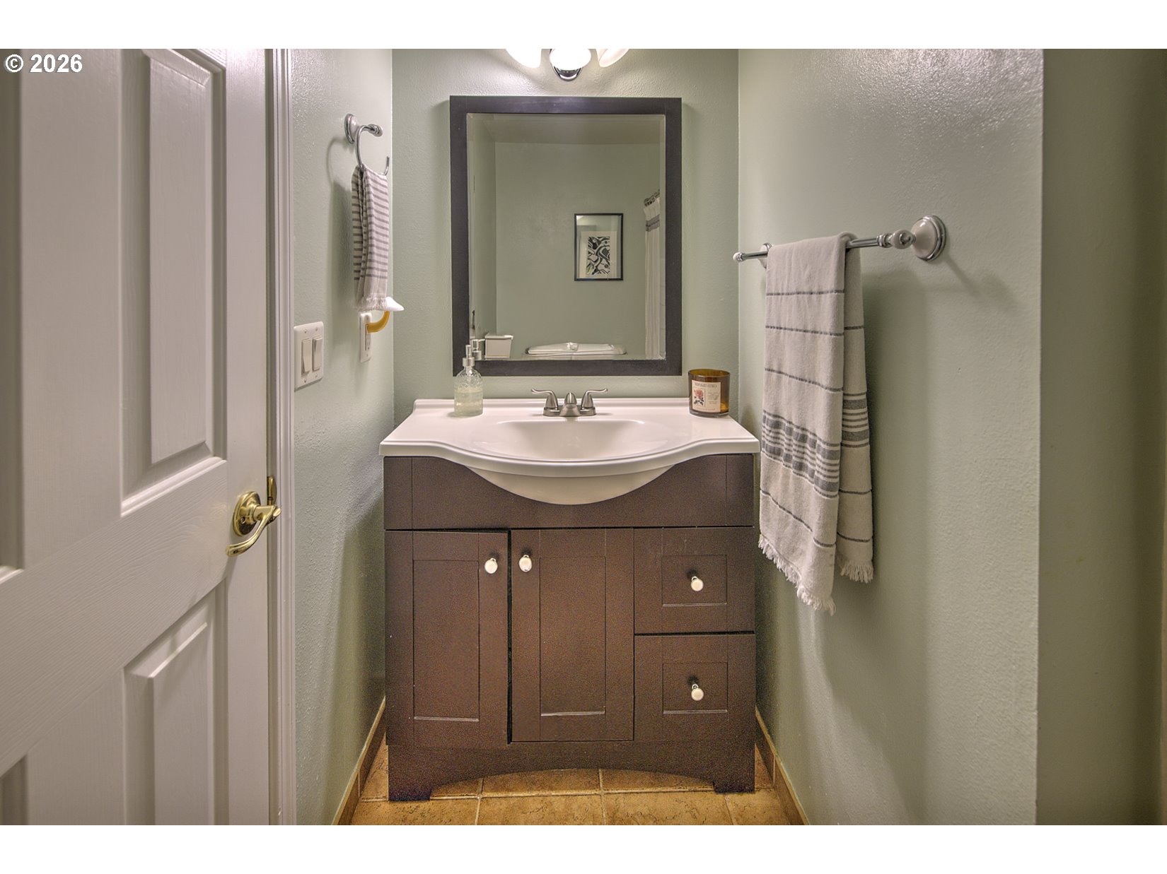 16020 Southwest Rosa Road Beaverton, OR 97007 - Photo 19 of 42 a bathroom with a sink and a mirror