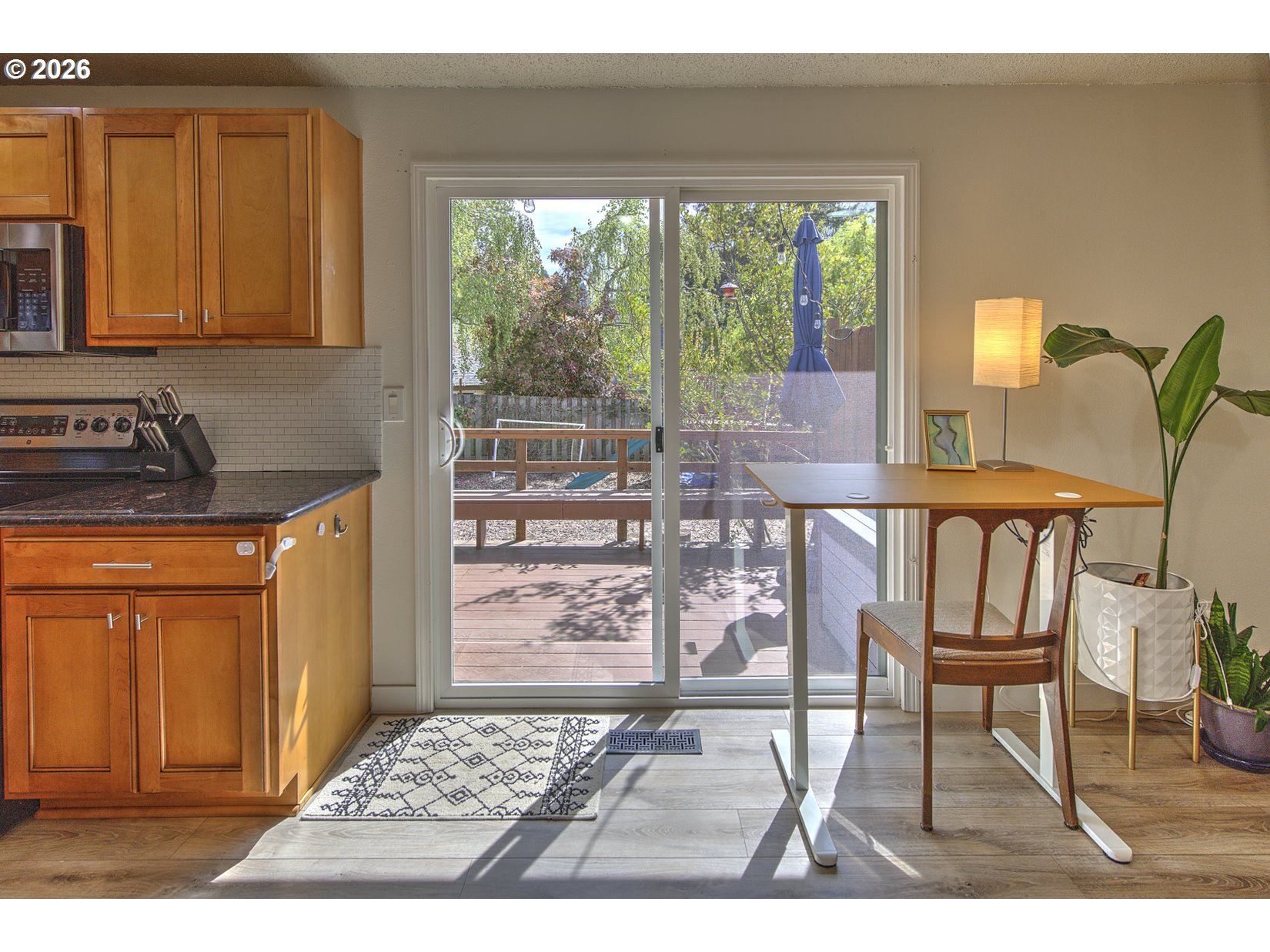 16020 Southwest Rosa Road Beaverton, OR 97007 - Photo 36 of 42 a view of a dining room with furniture and a window