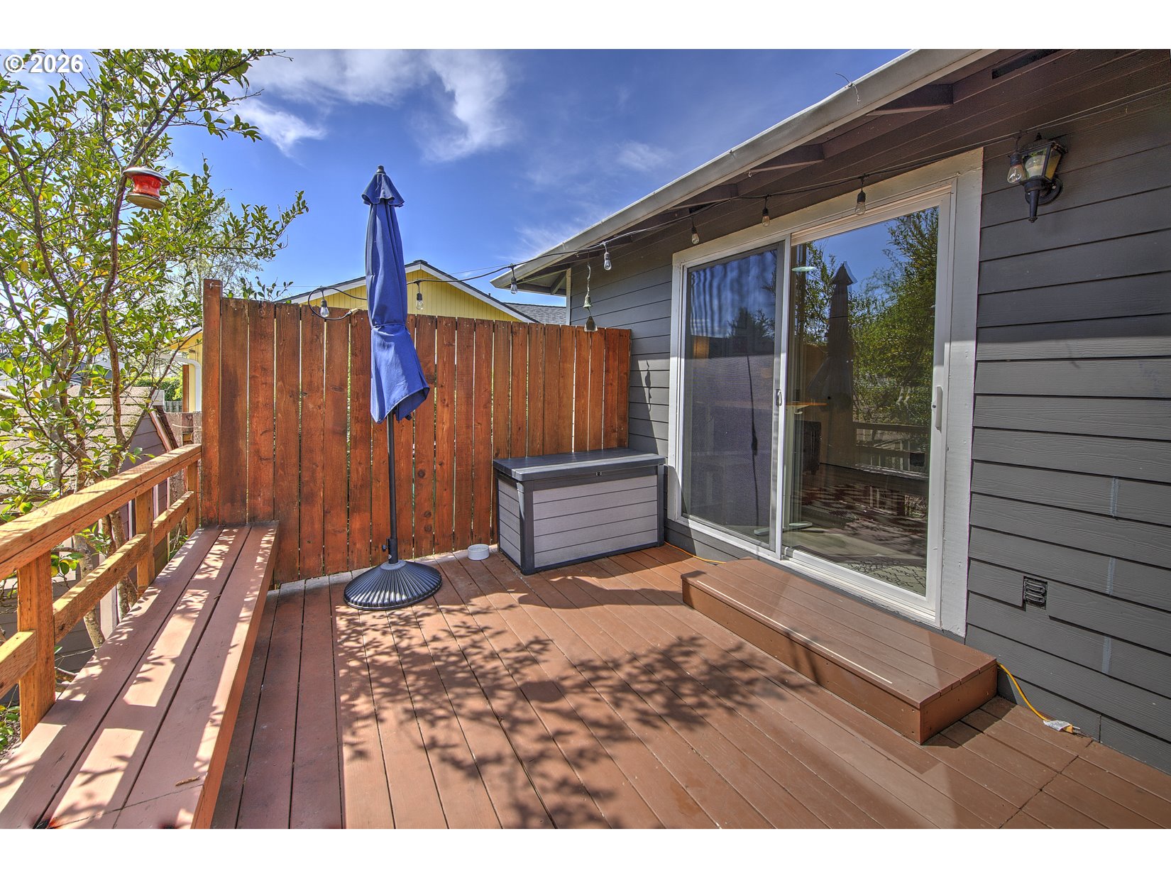 16020 Southwest Rosa Road Beaverton, OR 97007 - Photo 37 of 42 a view of backyard with wooden fence and large trees