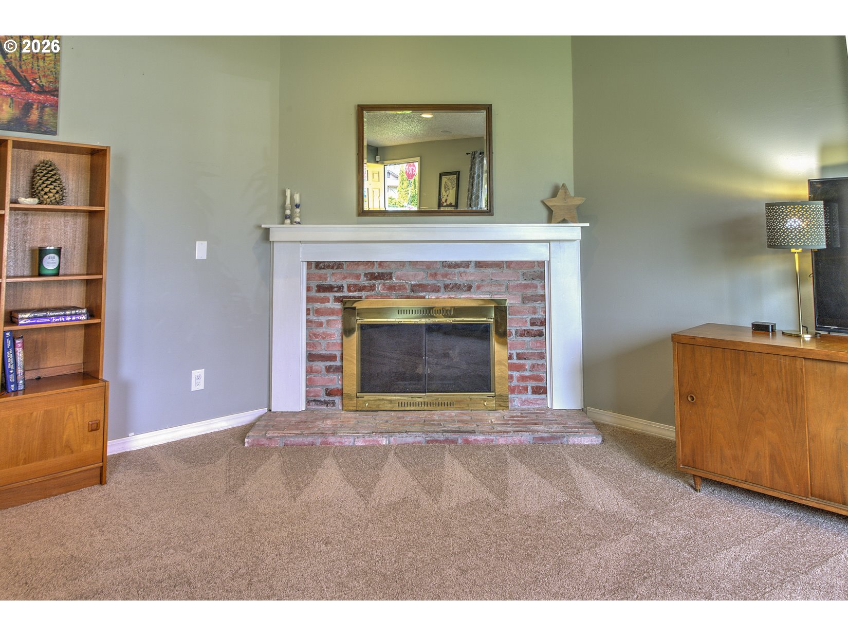 16020 Southwest Rosa Road Beaverton, OR 97007 - Photo 5 of 42 a living room with furniture and a fireplace