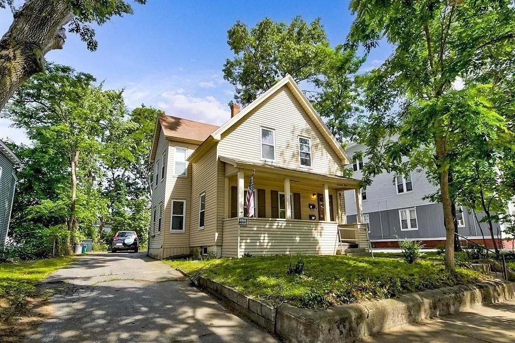78 Birch Street, Unit 2 Worcester, MA 01603 - Photo 1 of 12 a front view of a house with a yard