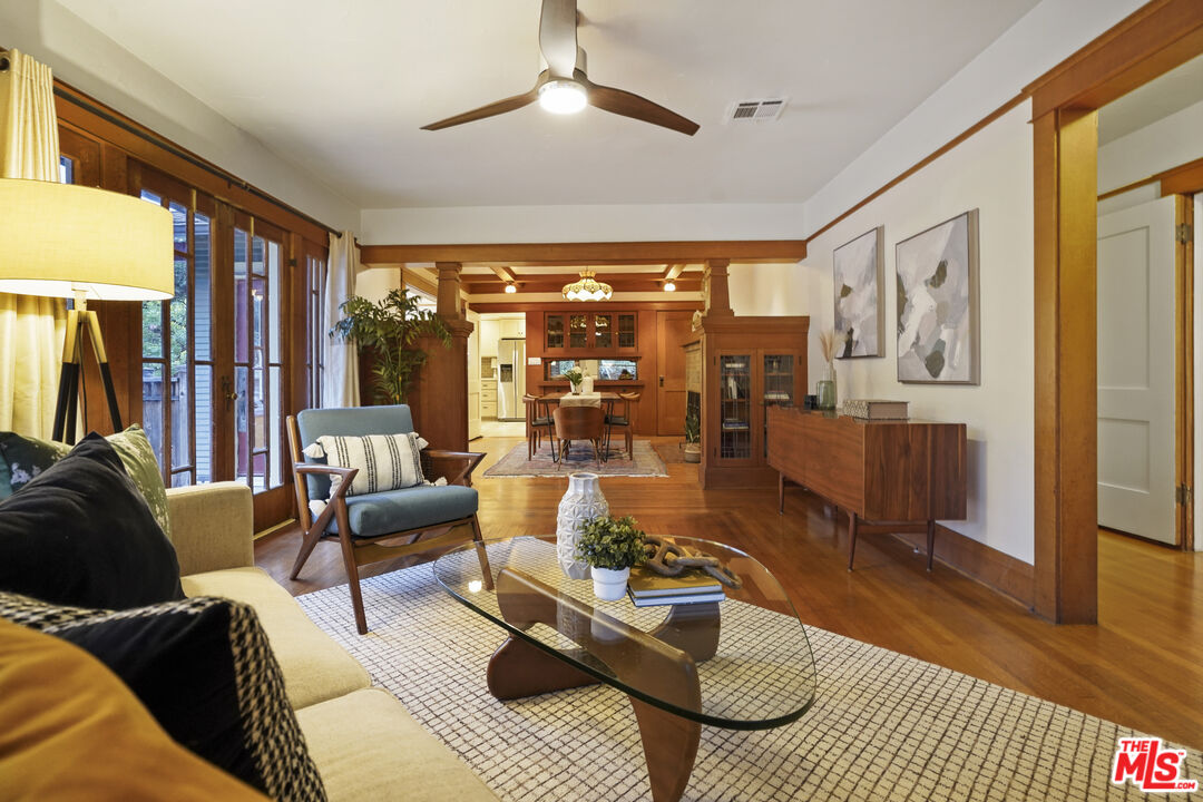 337 Cherry Avenue Long Beach, CA 90802 - Photo 13 of 52 a living room with furniture or couch and a chandelier