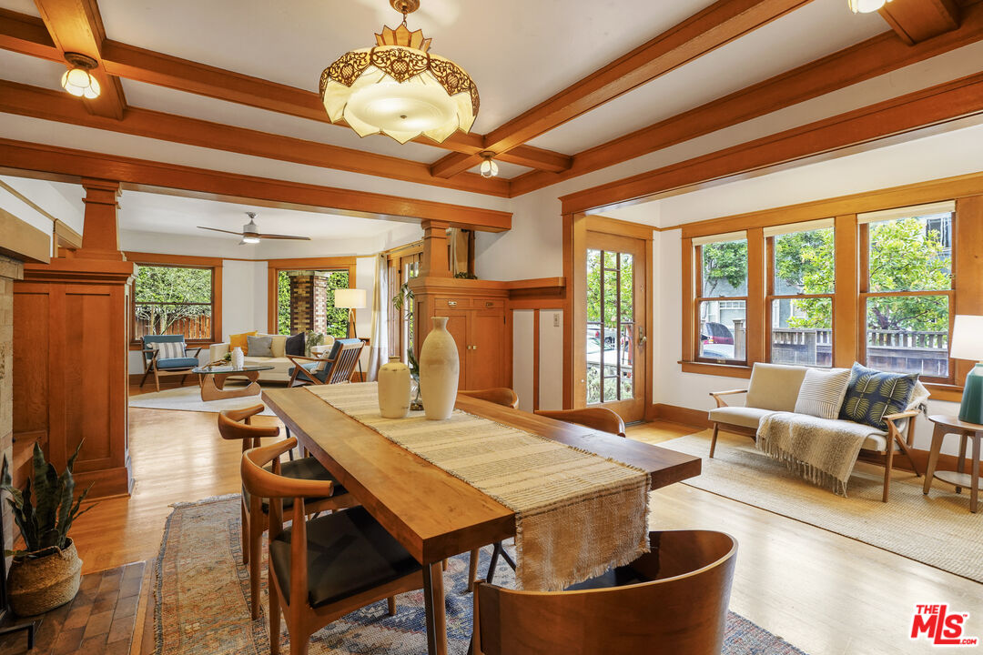 337 Cherry Avenue Long Beach, CA 90802 - Photo 14 of 52 a view of a dining room with furniture wooden floor and chandelier