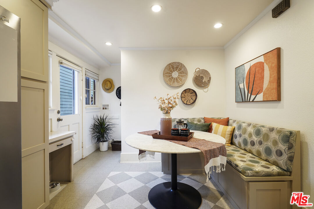 337 Cherry Avenue Long Beach, CA 90802 - Photo 21 of 52 a living room with furniture and a clock