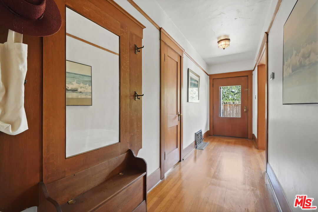337 Cherry Avenue Long Beach, CA 90802 - Photo 24 of 52 a view of a hallway with wooden floor and windows