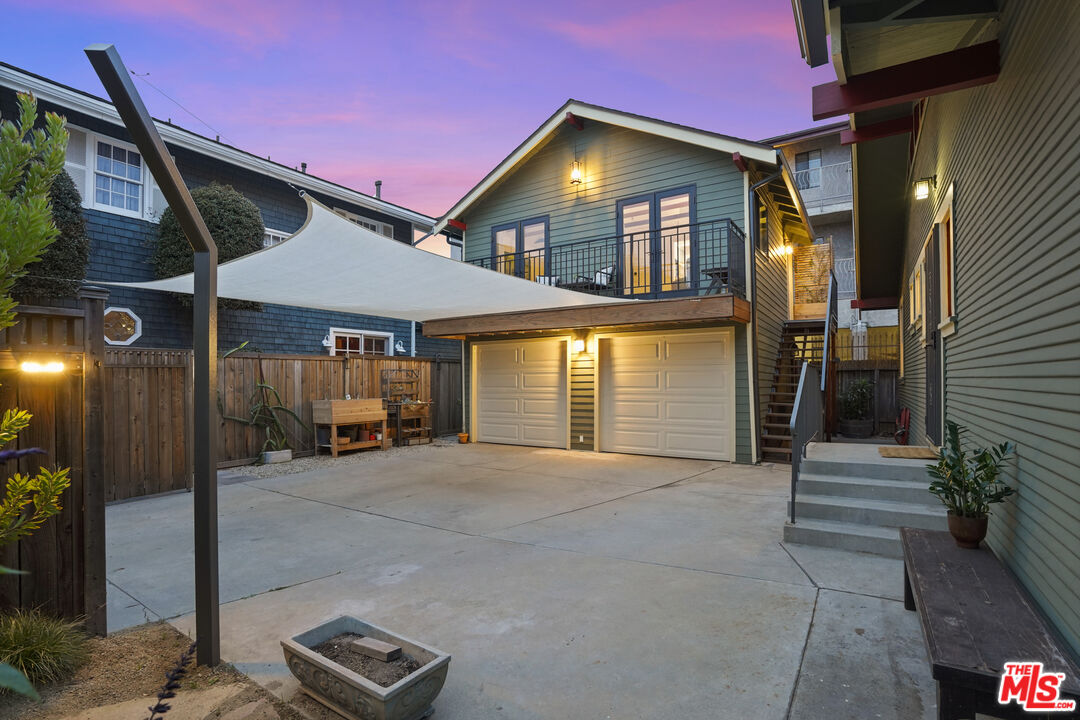 337 Cherry Avenue Long Beach, CA 90802 - Photo 33 of 52 a view of a house with a patio and a yard