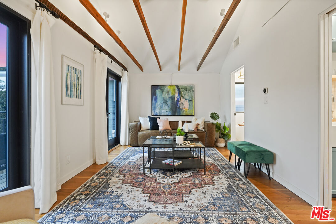 337 Cherry Avenue Long Beach, CA 90802 - Photo 35 of 52 a living room with furniture and a rug