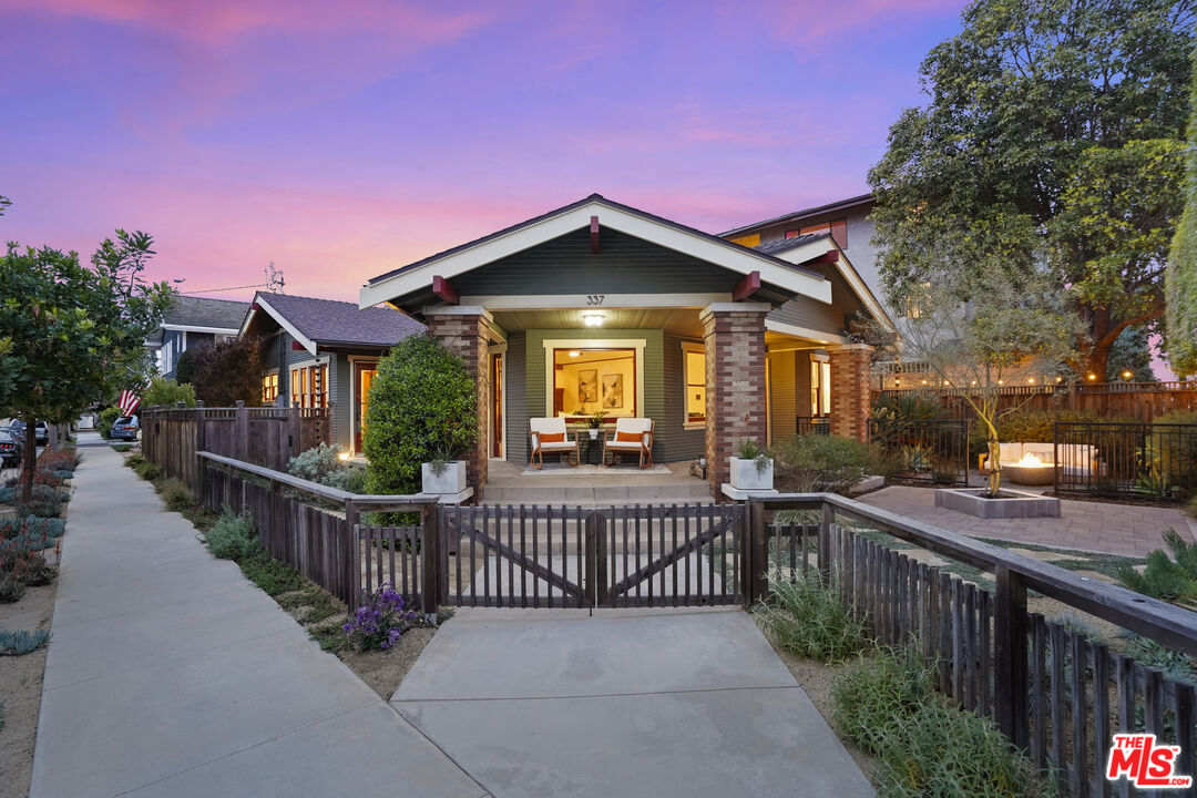 337 Cherry Avenue Long Beach, CA 90802 - Photo 46 of 52 a view of a house with wooden fence next to a yard