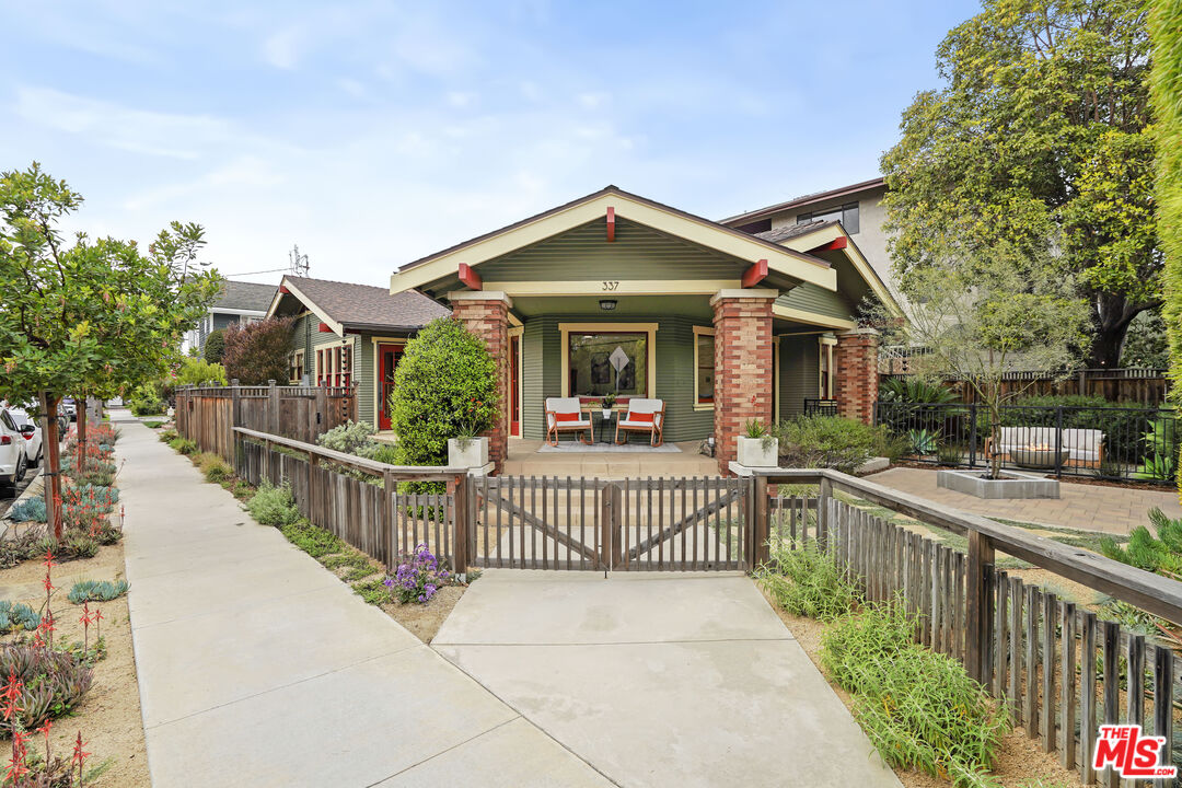 337 Cherry Avenue Long Beach, CA 90802 - Photo 8 of 52 a view of a house and wooden deck