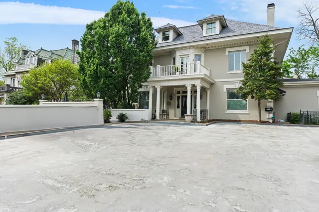 front view of a house with a street