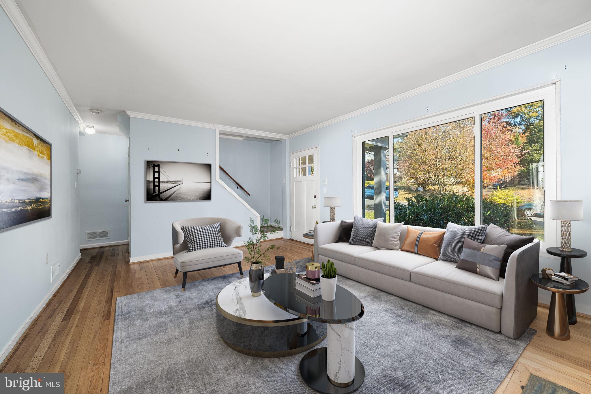 3924 Taney Avenue Alexandria, VA 22304 - Photo 11 of 57 a living room with furniture and a flat screen tv