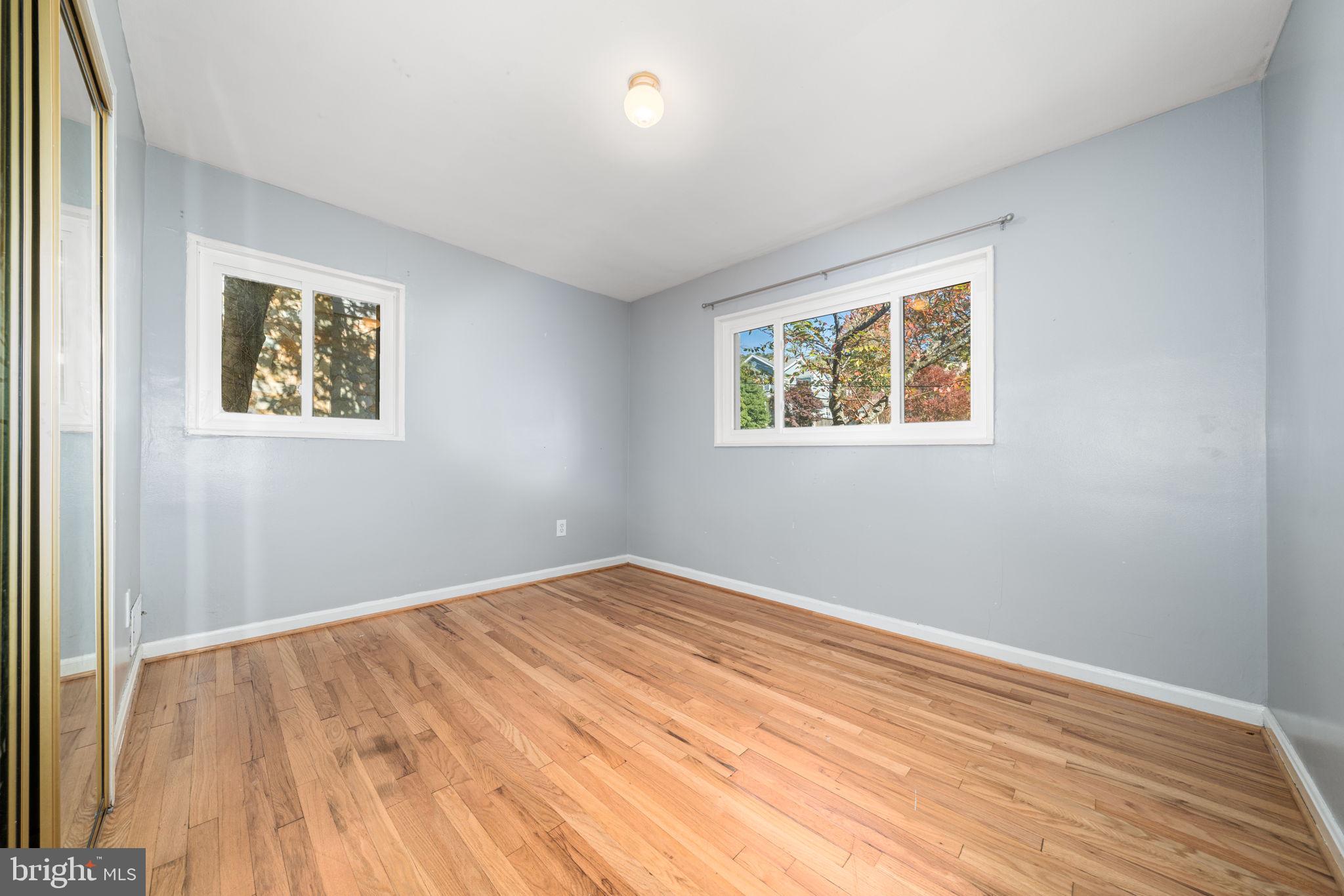 3924 Taney Avenue Alexandria, VA 22304 - Photo 19 of 57 a view of room with window and hardwood floor