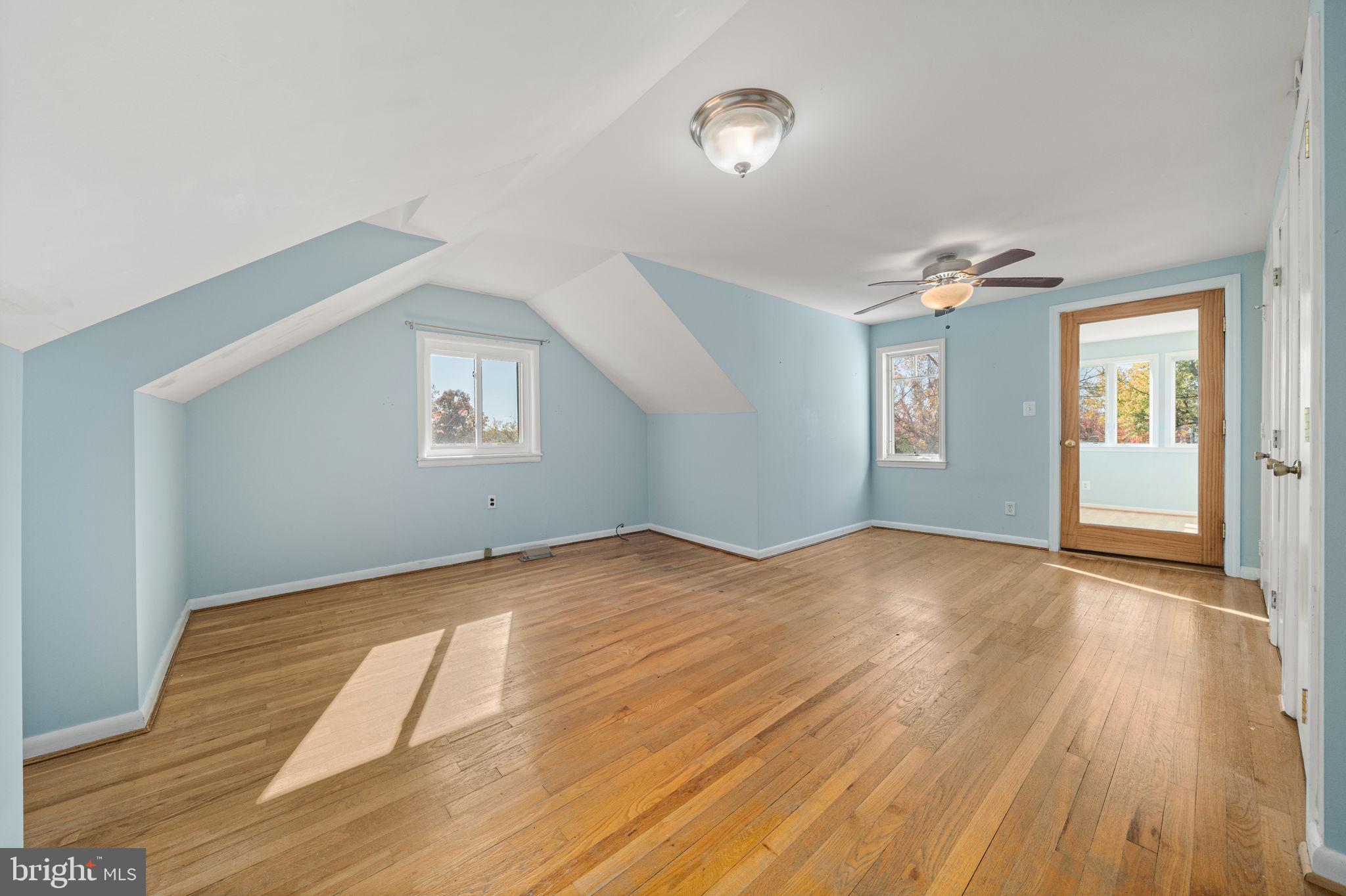 3924 Taney Avenue Alexandria, VA 22304 - Photo 24 of 57 a view of empty room with wooden floor and fan