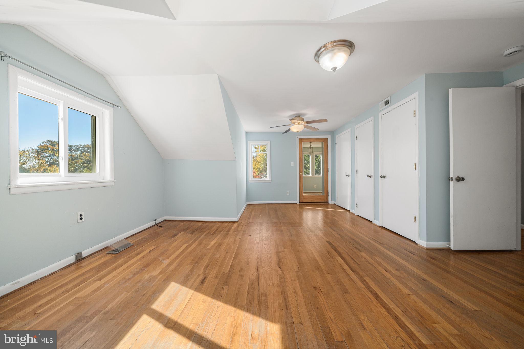 3924 Taney Avenue Alexandria, VA 22304 - Photo 27 of 57 wooden floor in an empty room with a window