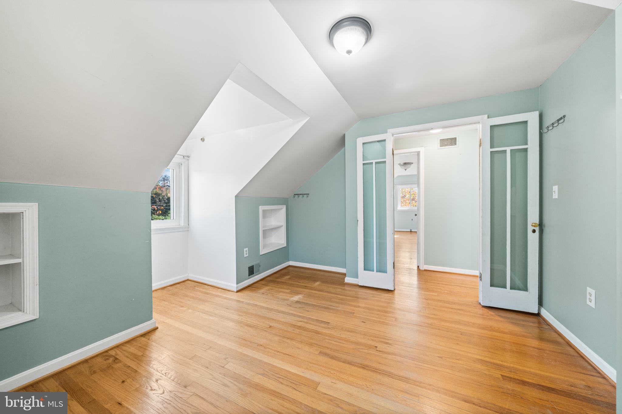 3924 Taney Avenue Alexandria, VA 22304 - Photo 34 of 57 a view of an empty room with wooden floor