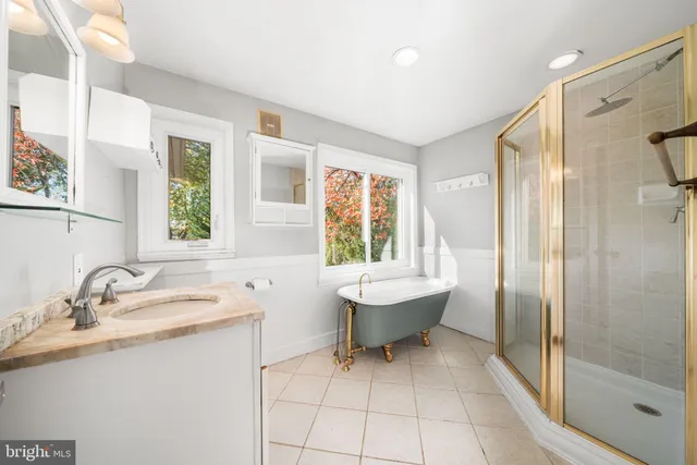 a view of a hallway with washer and dryer