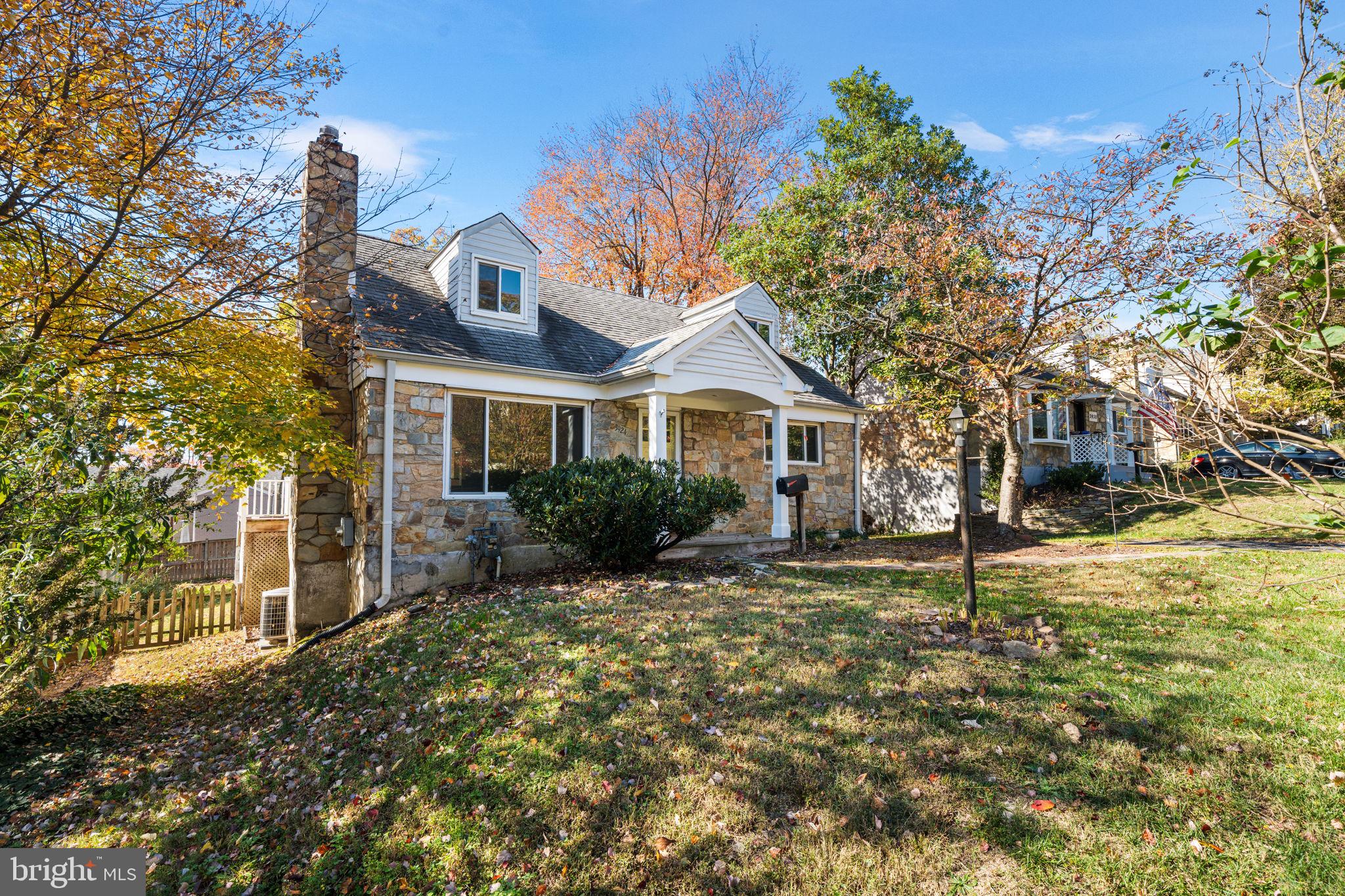 3924 Taney Avenue Alexandria, VA 22304 - Photo 4 of 57 a front view of a house with a yard