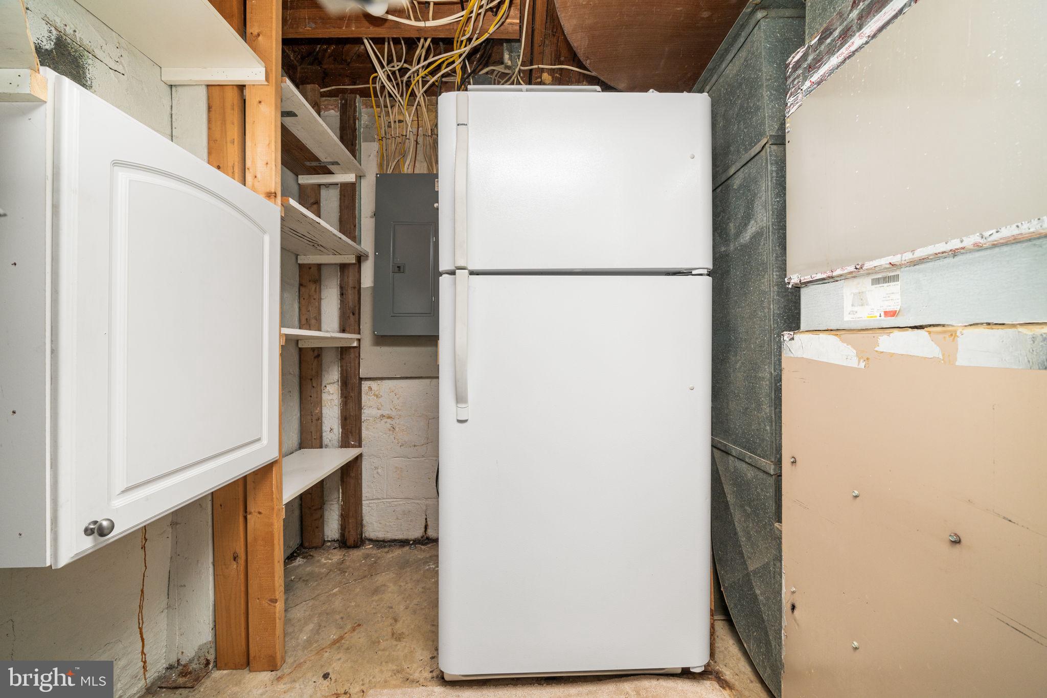 3924 Taney Avenue Alexandria, VA 22304 - Photo 46 of 57 a view of storage and utility room with washer and dryer