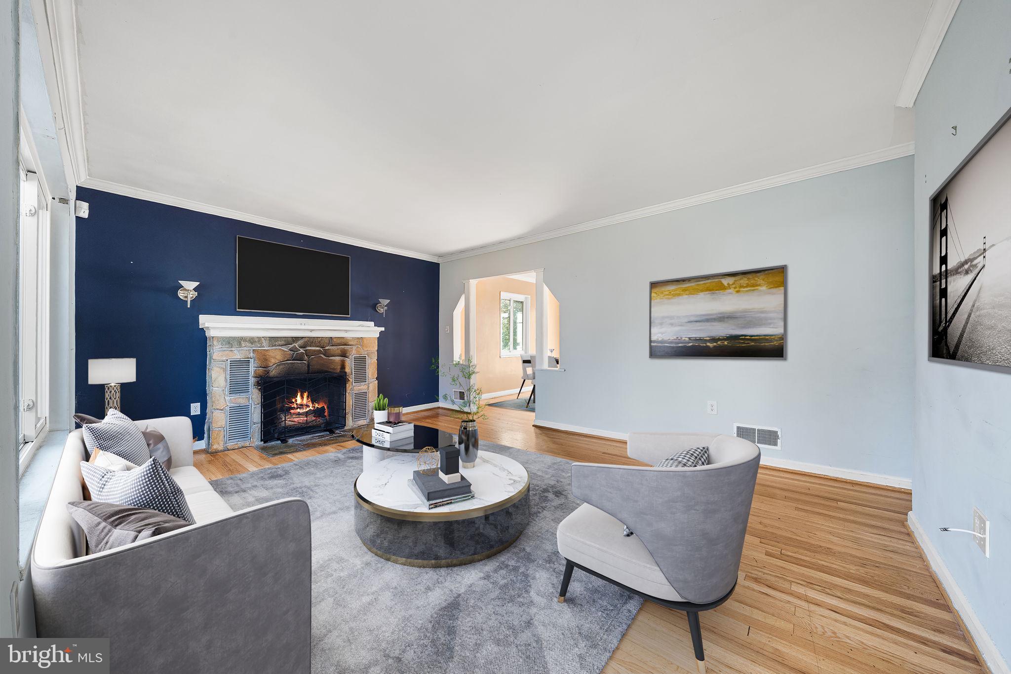 3924 Taney Avenue Alexandria, VA 22304 - Photo 6 of 57 a living room with furniture and a fireplace