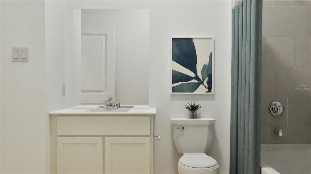 5513 Morant Bay Path Kissimmee, FL 34758 - Photo 8 of 32 a bathroom with a sink toilet and mirror