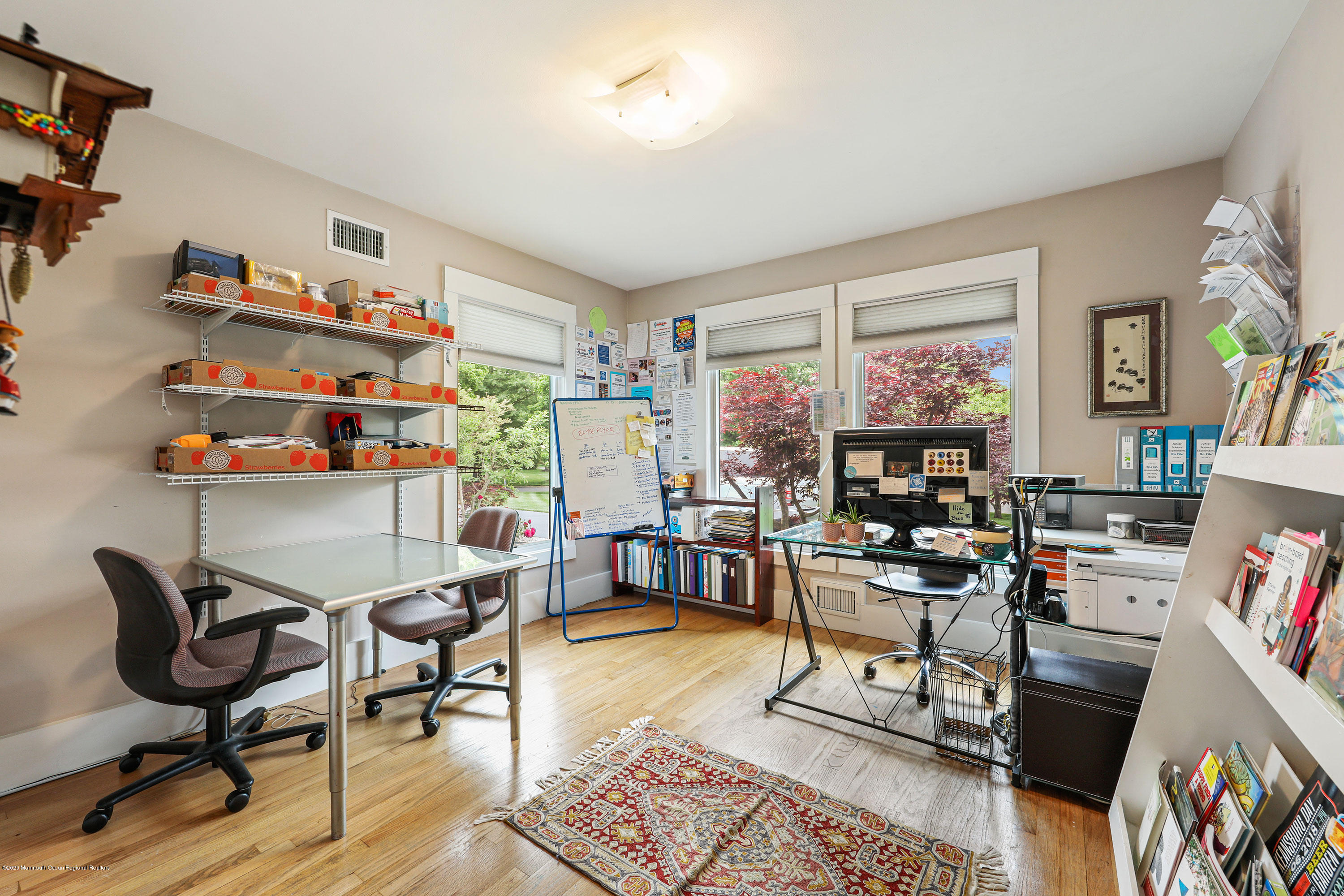 8 Riverside Drive Rumson, NJ 07760 - Photo 20 of 29 a living room with furniture and a flat screen tv
