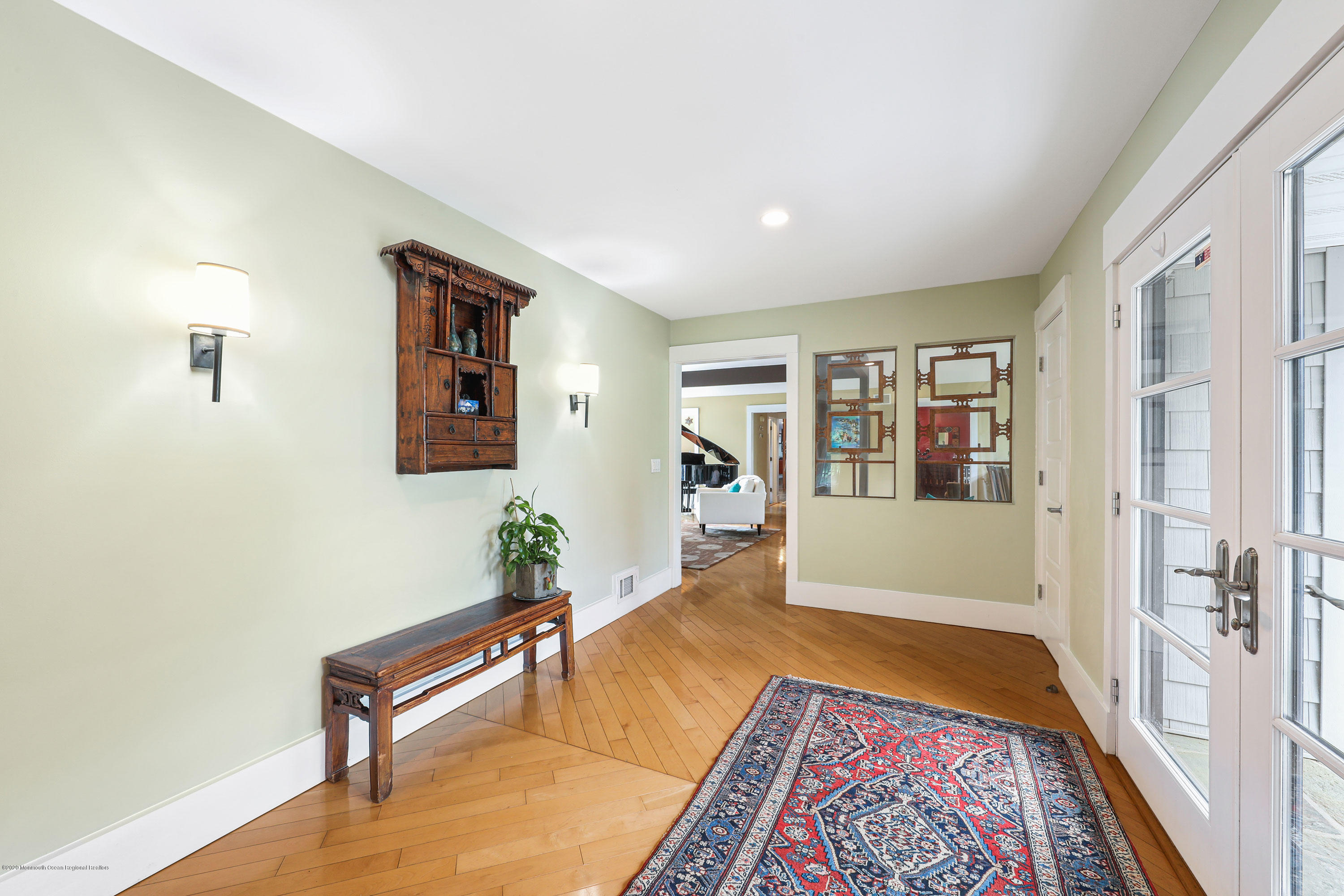 8 Riverside Drive Rumson, NJ 07760 - Photo 4 of 29 a living room with furniture and a rug