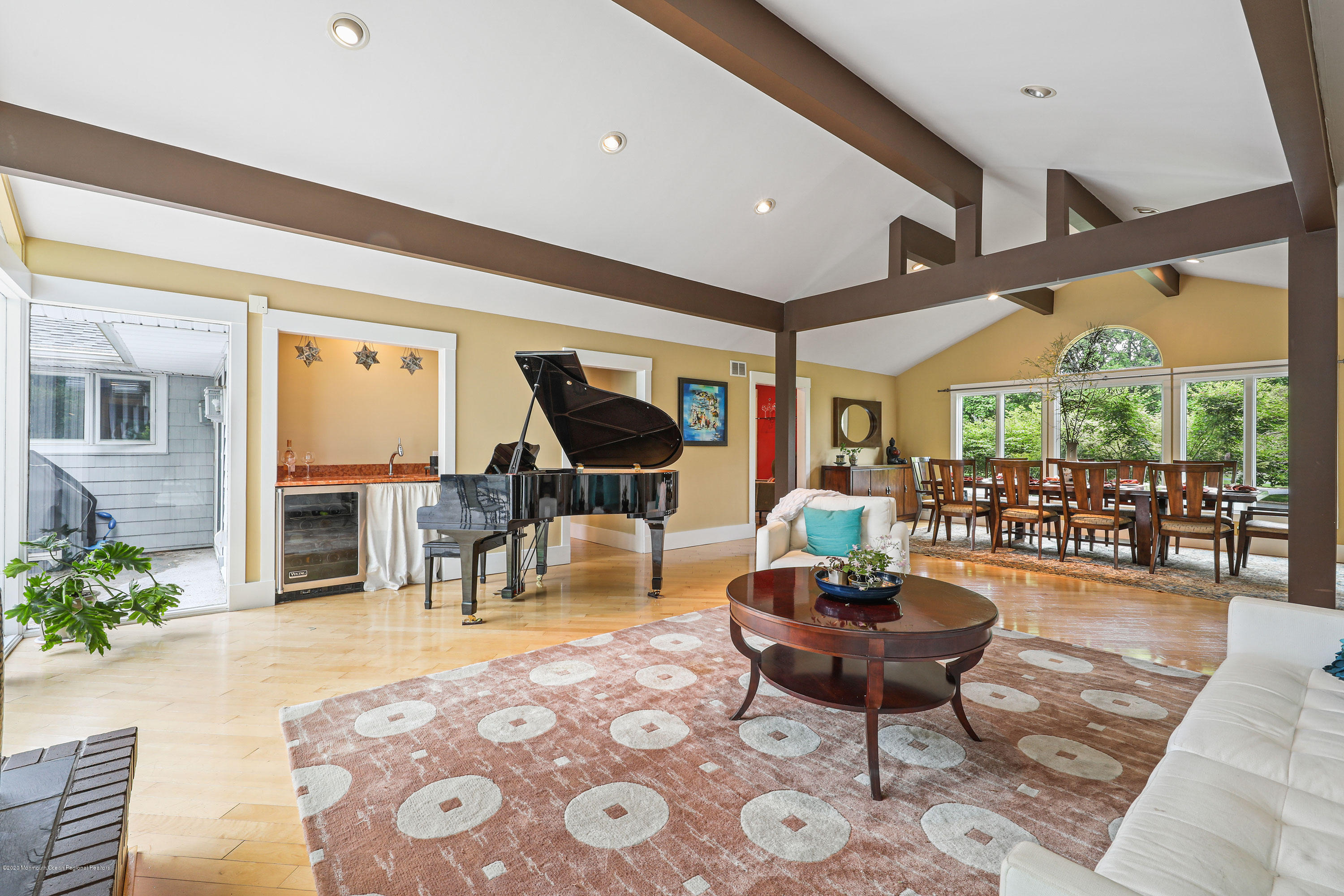 8 Riverside Drive Rumson, NJ 07760 - Photo 6 of 29 a living room with furniture a fireplace and a large window