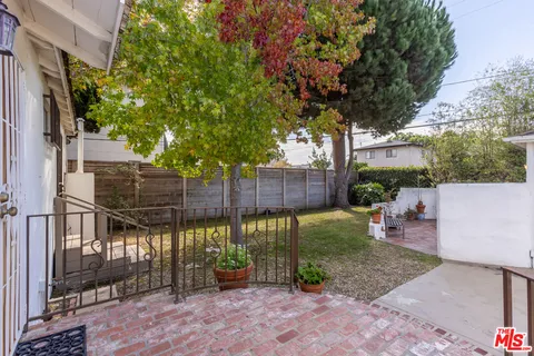 a view of a tables and chairs in patio