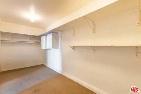 a view of a house with a yard and garage