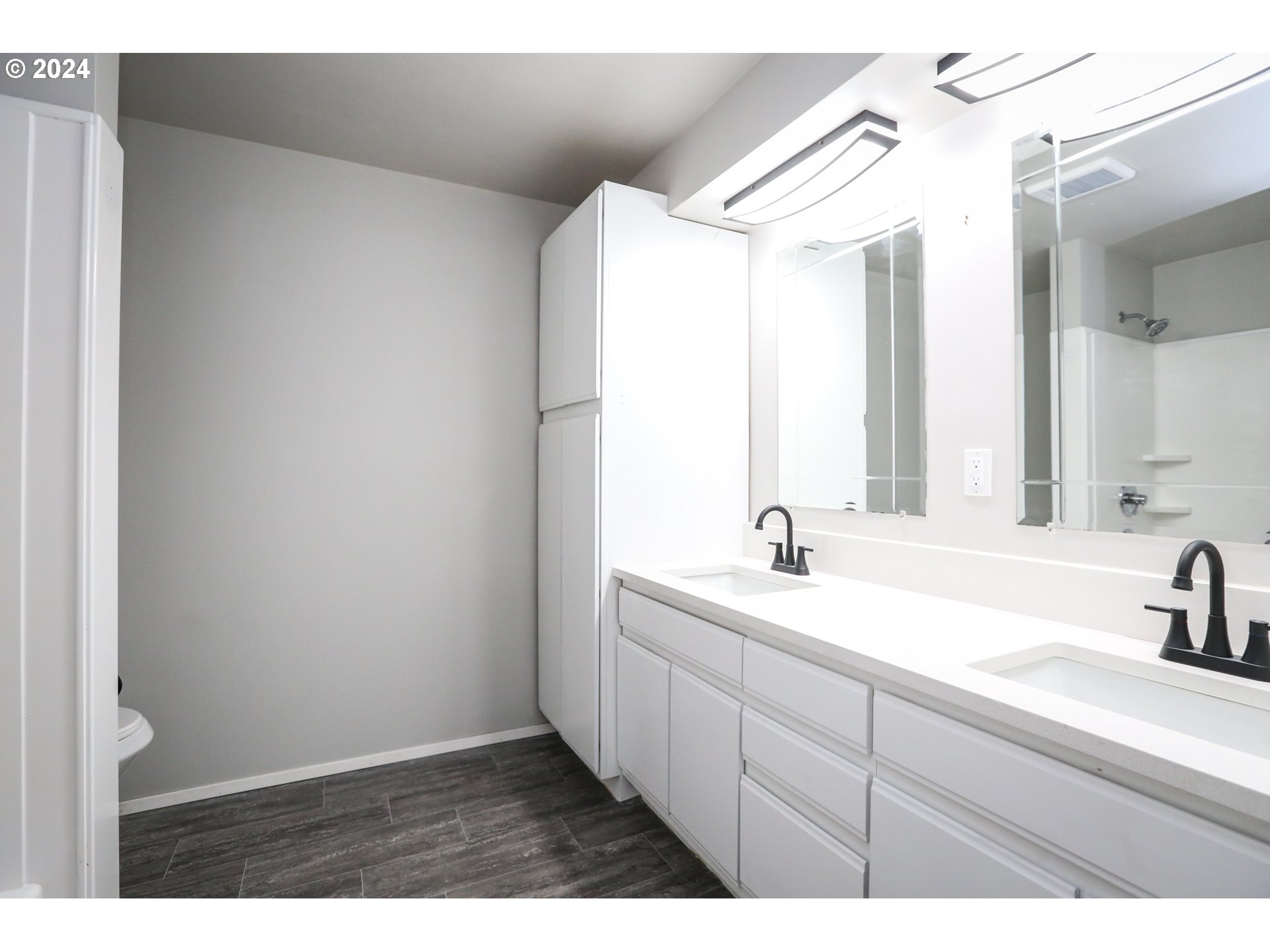 805 Kelly Lane Eugene, OR 97404 - Photo 17 of 31 a bathroom with a sink and a mirror