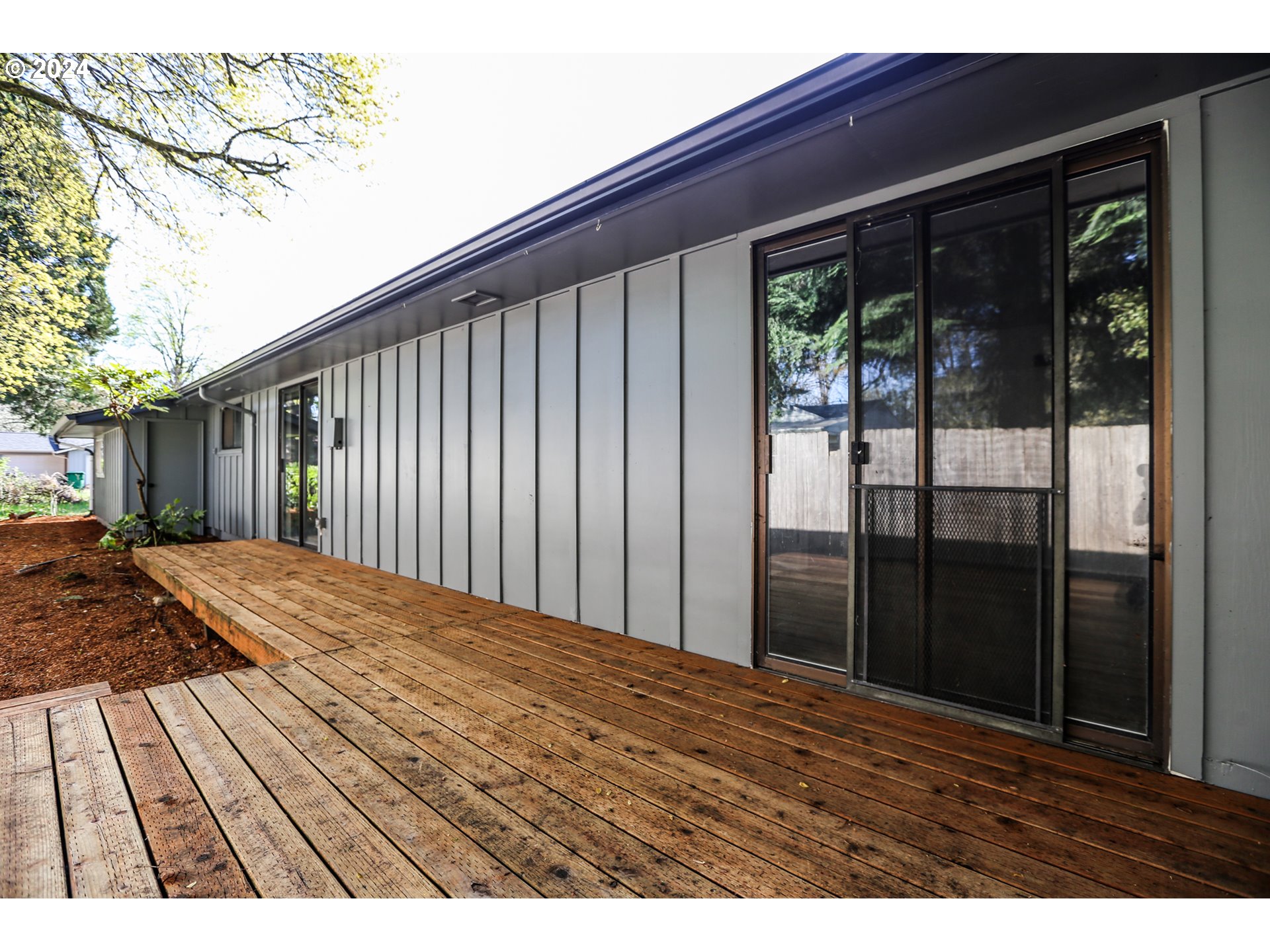 805 Kelly Lane Eugene, OR 97404 - Photo 28 of 31 a view of wooden floor and a window
