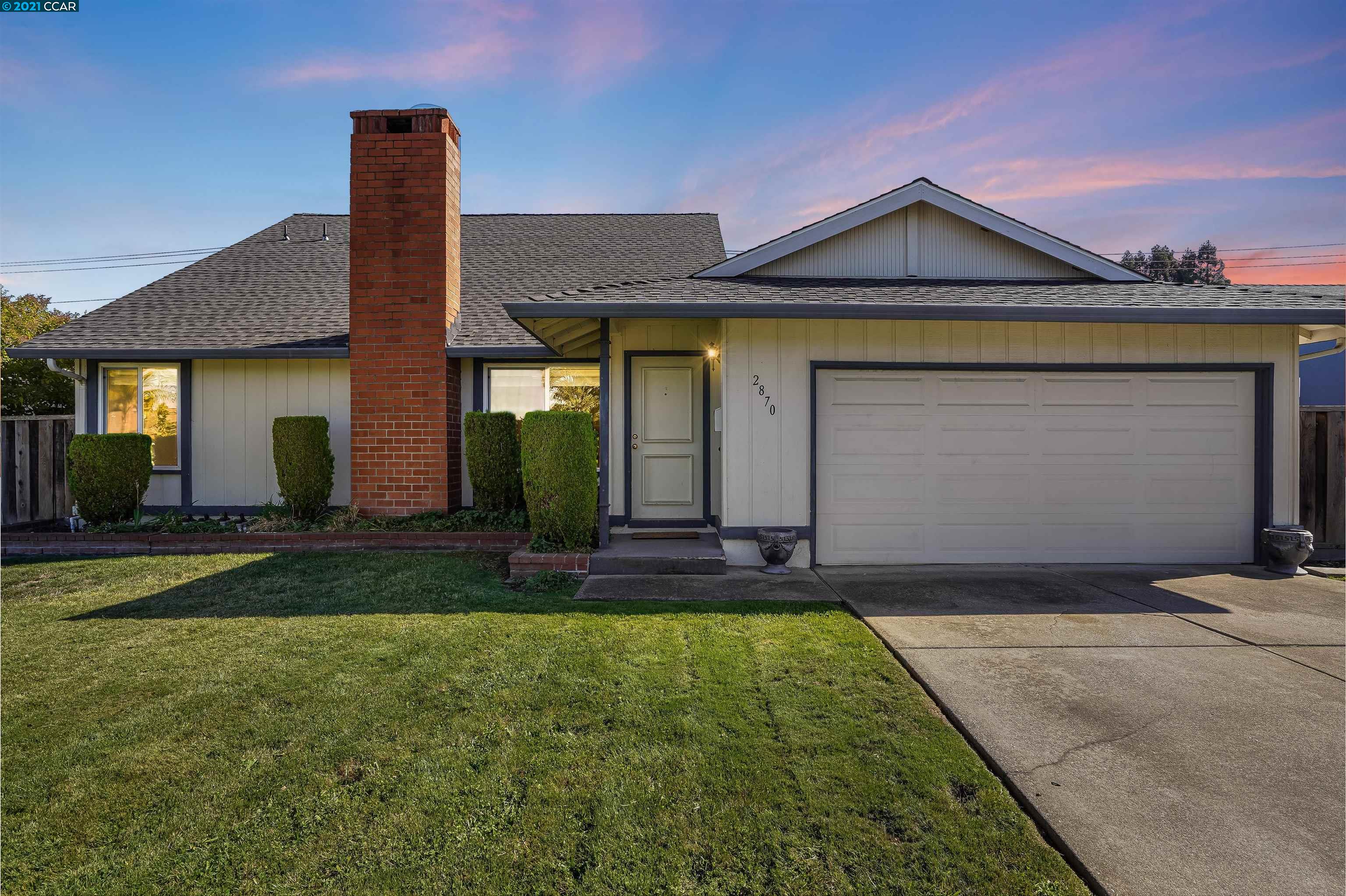 2870 Calais Drive San Ramon, CA 94583 - Photo 1 of 1 a front view of a house with a yard and garage