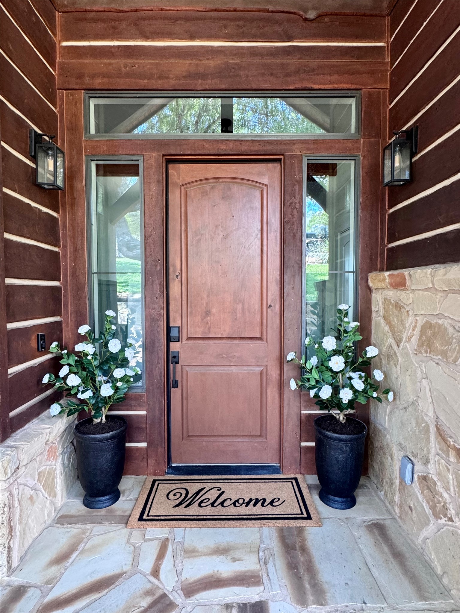 18852 Hidden Ridge Place Jonestown, TX 78645 - Photo 3 of 29 a view of a entryway door of the house
