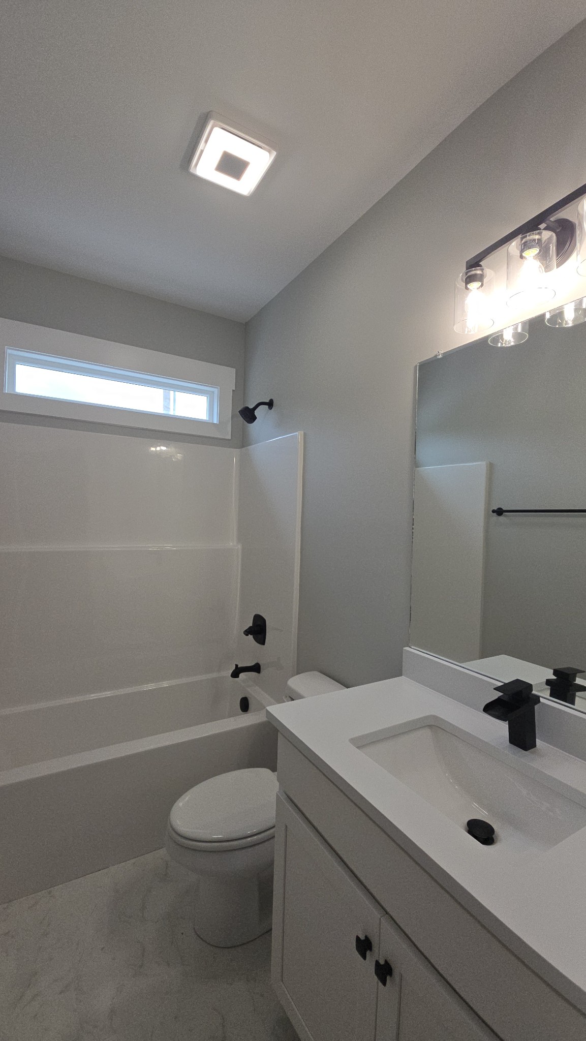 11533 Karo Road Bell Buckle, TN 37020 - Photo 22 of 22 a bathroom with a sink a toilet and shower