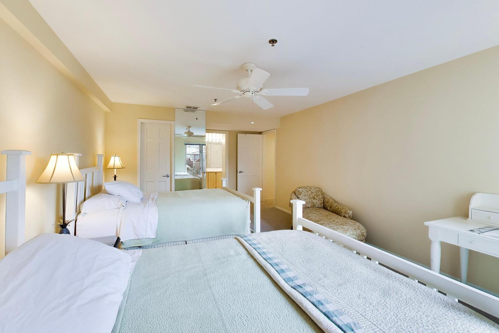 308 North Happ Road, Unit 108 Northfield, IL 60093 - Photo 18 of 31 a bedroom with a bed and a chandelier