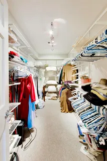 a view of gym equipment and lots of windows