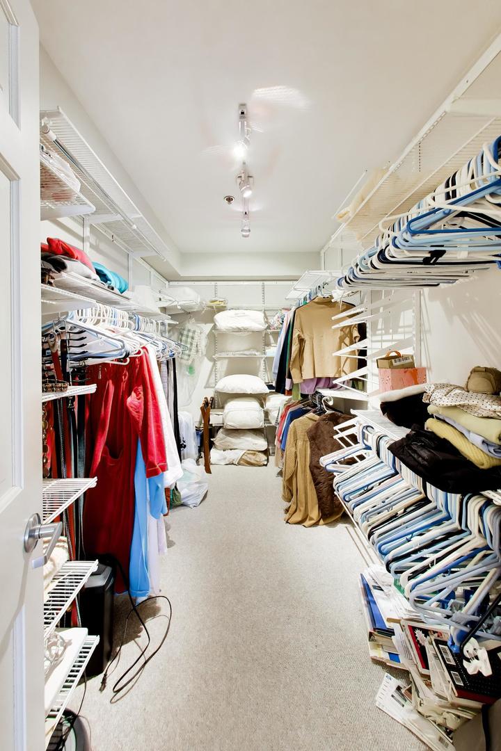 308 North Happ Road, Unit 108 Northfield, IL 60093 - Photo 19 of 31 a view of gym equipment and lots of windows