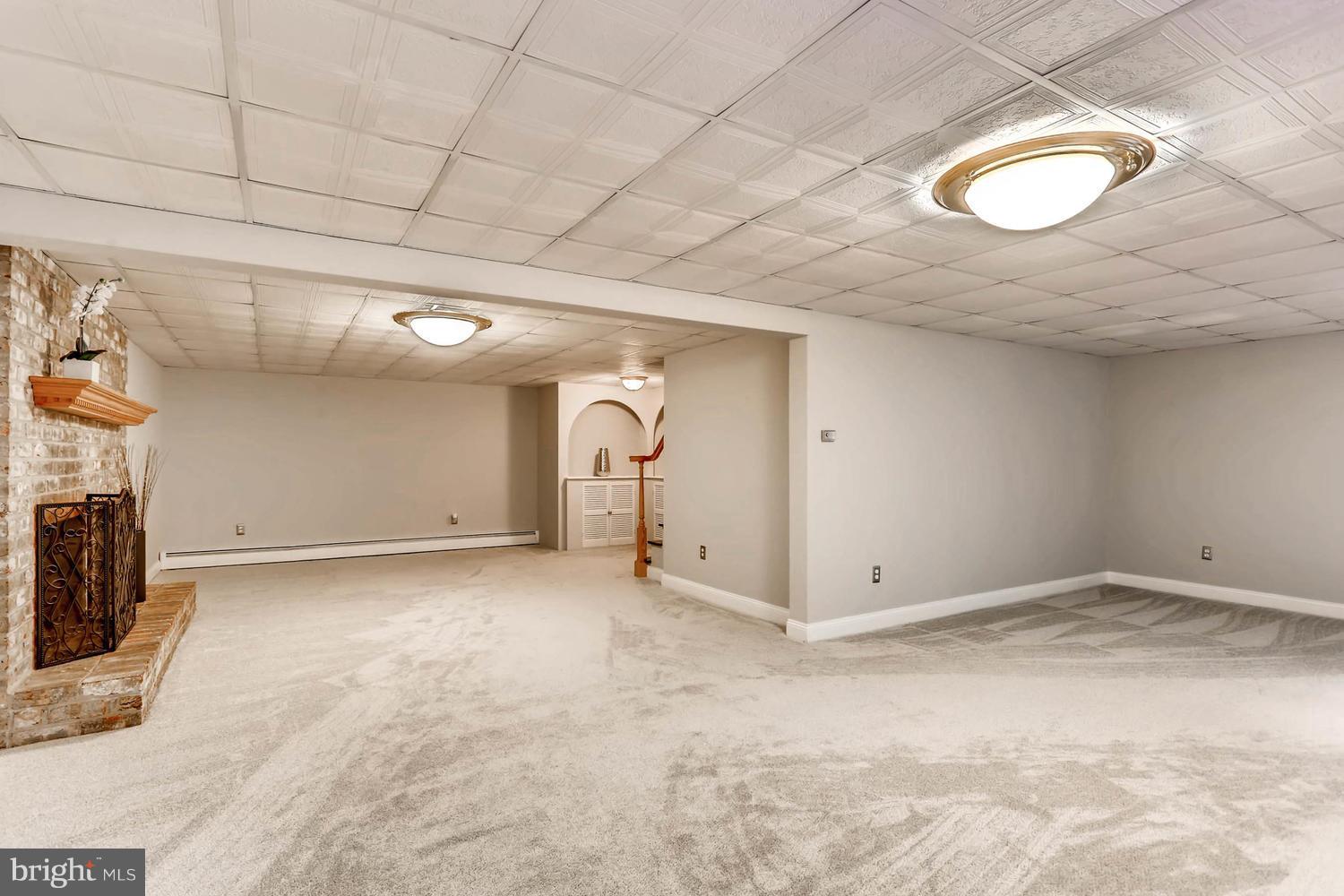2004 Furnace Road Fallston, MD 21047 - Photo 23 of 30 Basement recreationroom w/fireplace, new carpet