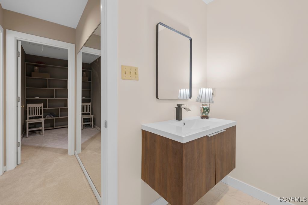 532 Fords Road Manakin-Sabot, VA 23103 - Photo 30 of 46 a bathroom with a sink and a mirror