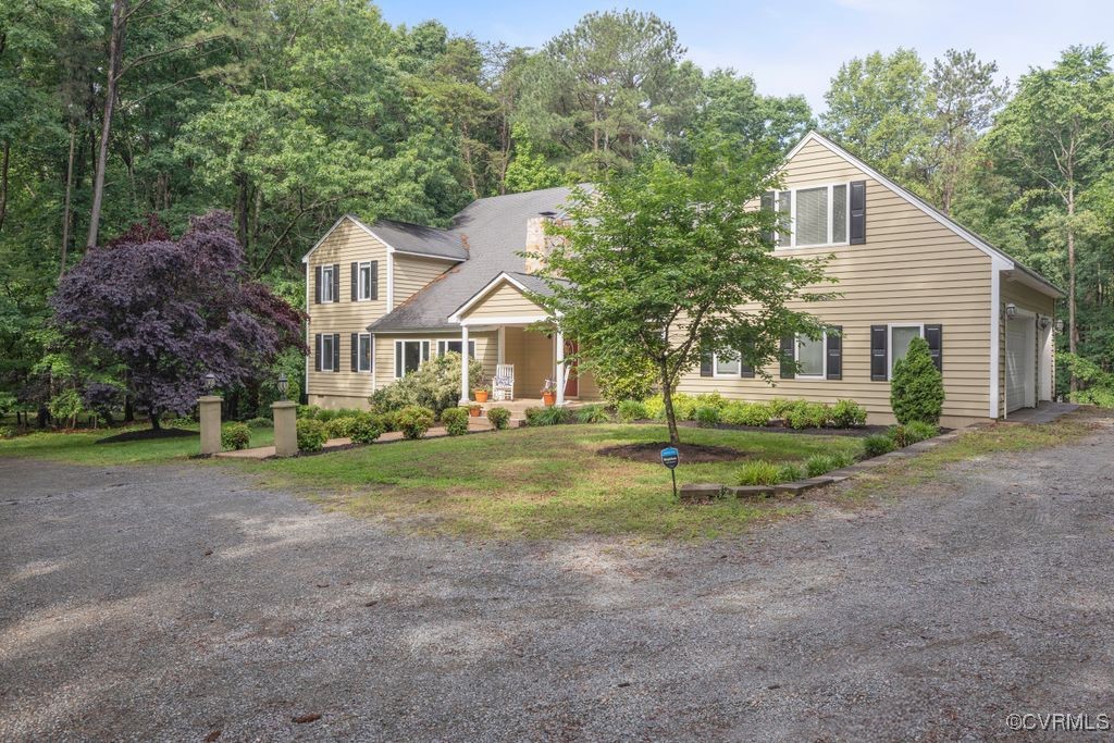 532 Fords Road Manakin-Sabot, VA 23103 - Photo 3 of 46 a view of a big house with a big yard and large trees