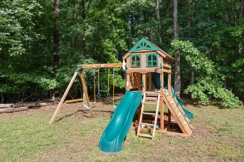 a house with trees in the background