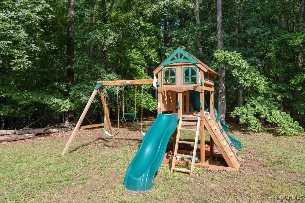 532 Fords Road Manakin-Sabot, VA 23103 - Photo 36 of 46 a house with trees in the background