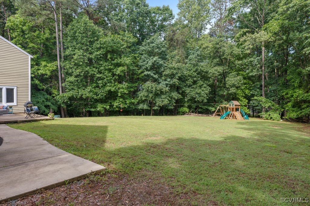 532 Fords Road Manakin-Sabot, VA 23103 - Photo 37 of 46 a front view of a house with a yard and trees