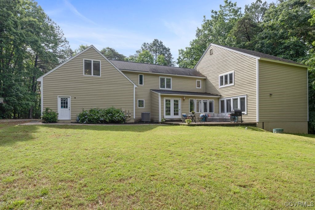 532 Fords Road Manakin-Sabot, VA 23103 - Photo 38 of 46 a front view of house with yard and trees in the background