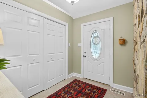 a view of room with window and hardwood floor