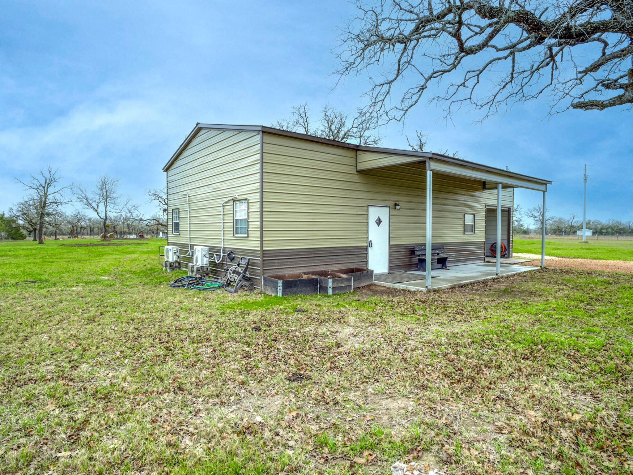 3747 Sparta Field Road Flatonia, TX 78941 - Photo 13 of 37 a view of a house with backyard and sitting area