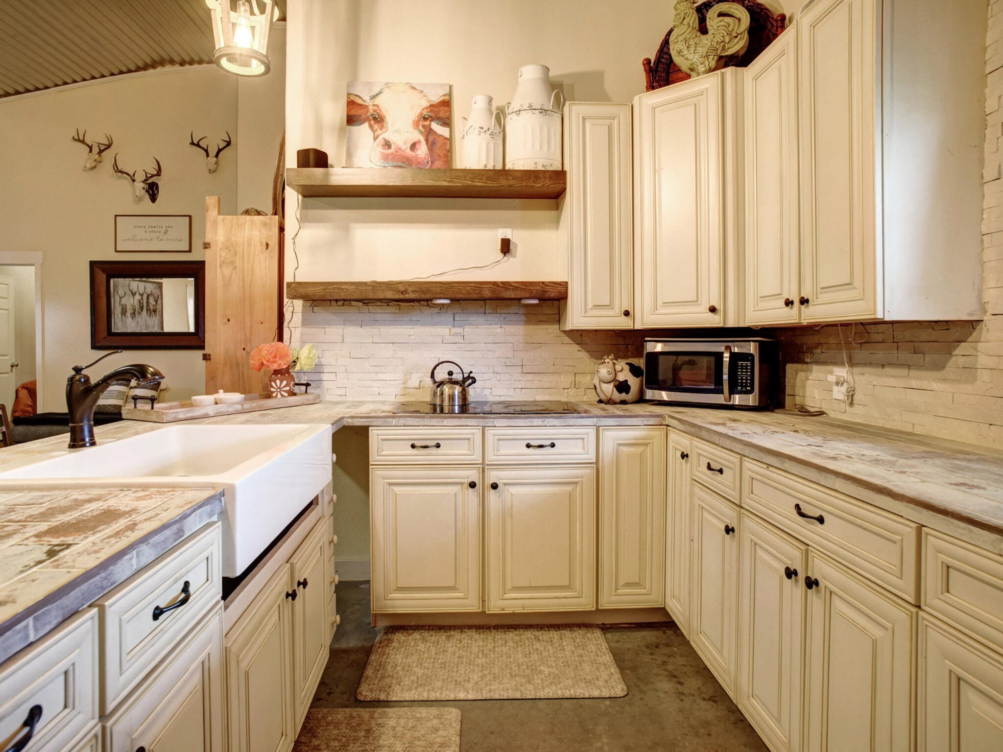 3747 Sparta Field Road Flatonia, TX 78941 - Photo 22 of 37 a kitchen with stainless steel appliances granite countertop a sink and dishwasher a stove with wooden floor