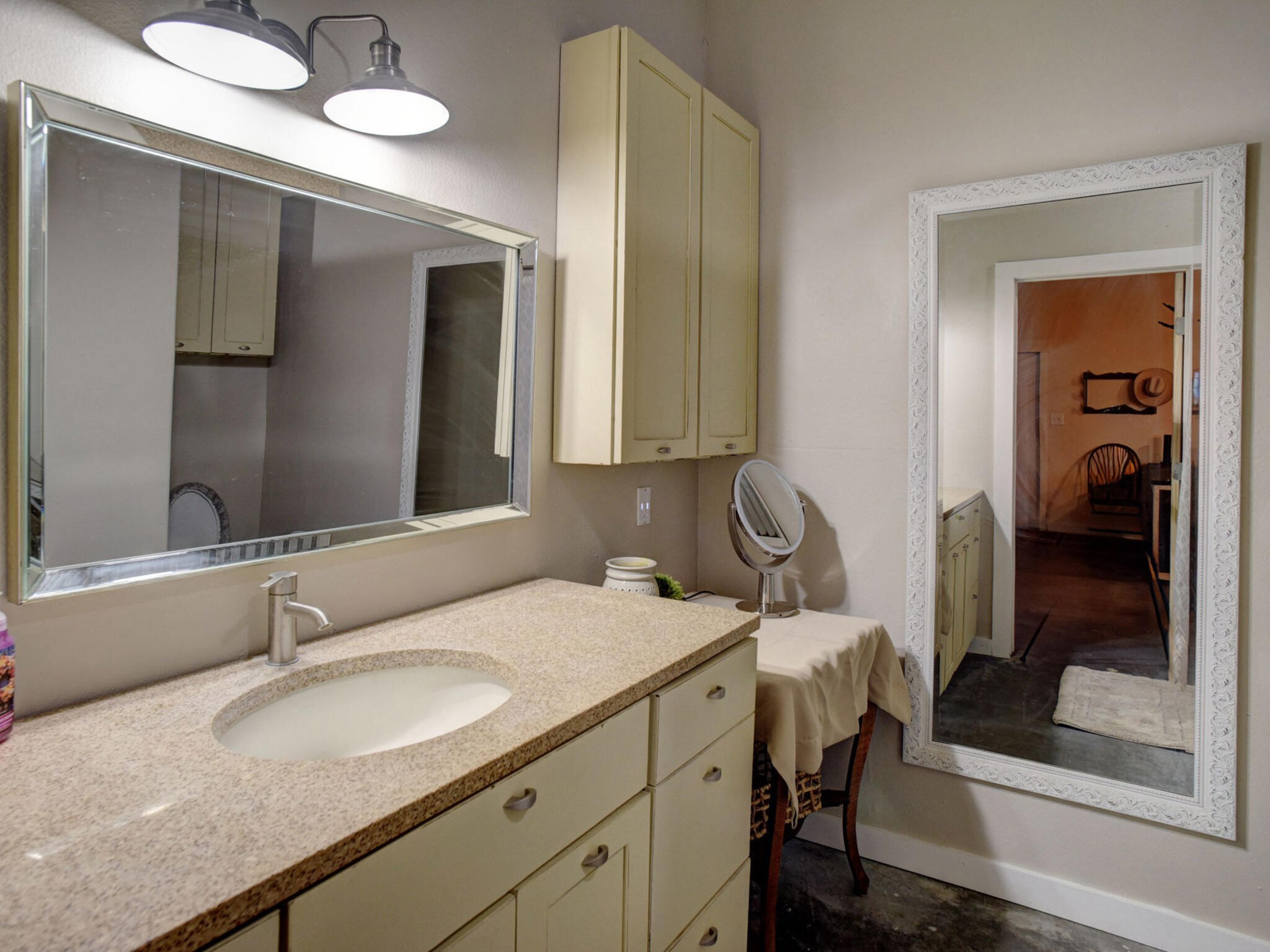 3747 Sparta Field Road Flatonia, TX 78941 - Photo 27 of 37 a bathroom with a sink and a mirror